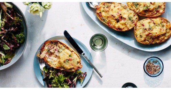 Cheesy Baked Spaghetti Squash Boats with Salami, Sun-Dried Tomatoes, and Spinach